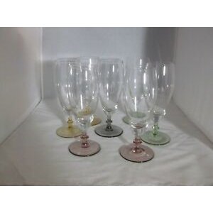 Vintage clear glass of wine with tinted glass base