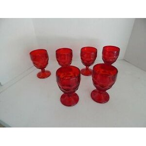 Red dimples, water glass, chunky wine cellar