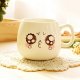 Various cute ceramic cups with spoon