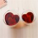 Valentine heart double transparent glass cup of coffee in the afternoon