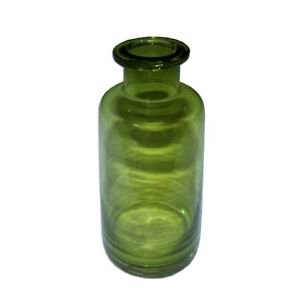 Green glass bottles, cups