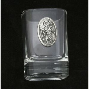 Transparent shot small glass of patron saint Christmas present