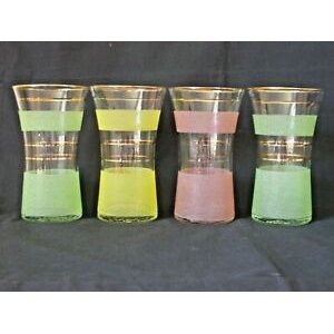 Vintage metal and colored frosted glass accompanying cups