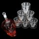 Skull-shaped glass drinking vessel drinking glass article