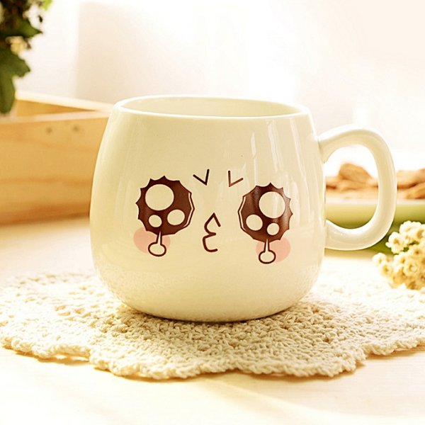 Various cute ceramic cups with spoon